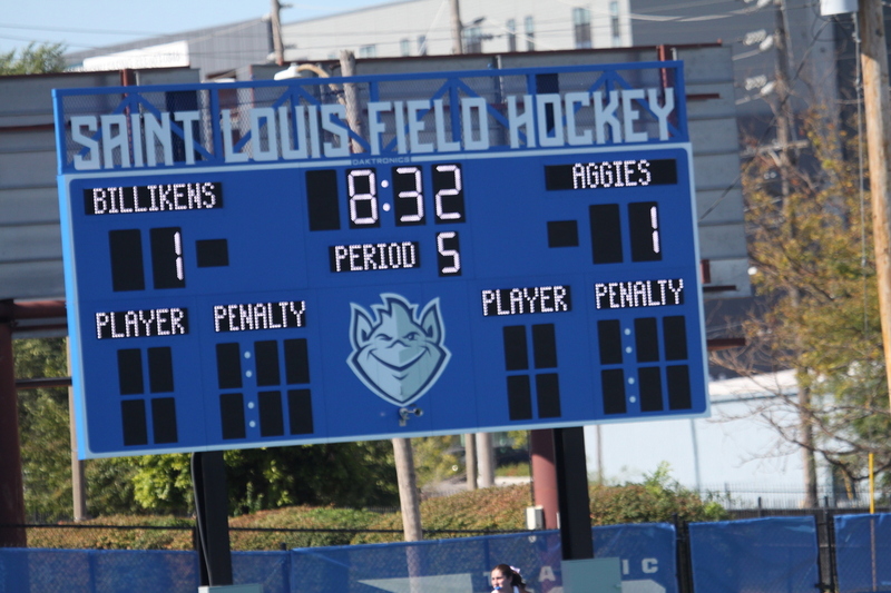 IMG_0458.jpg :: Saint Louis University (SLU) Women's Field Hockey vs University of California Davis 2025 at the SLU Field Hockey Complex. UC Davis won 2 to 1. The UC Davis players are wearing pink shoes and there are Pink Ribbons painted on the players sticks. Today is Billikens Pink Game for Breast Cancer Awareness and Alumnae Day. This is the second season at the new SLU Field Hockey Complex, and it marks, the 50th anniversary of the St. Louis University Field Hockey program which began in 1975. NCAA Division I 