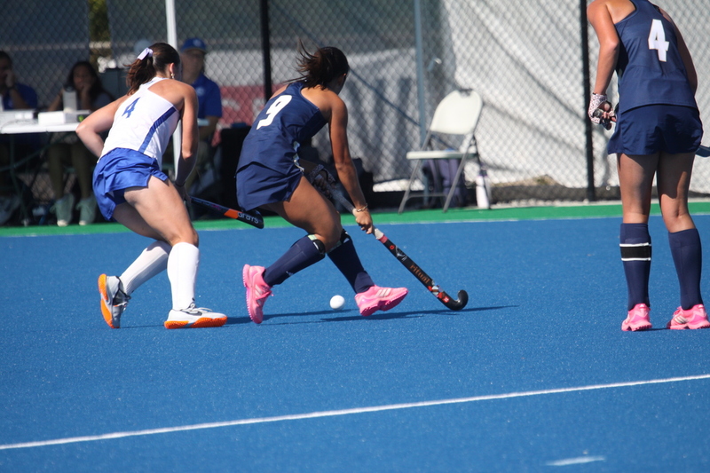 IMG_0459.jpg :: Saint Louis University (SLU) Women's Field Hockey vs University of California Davis 2025 at the SLU Field Hockey Complex. UC Davis won 2 to 1. The UC Davis players are wearing pink shoes and there are Pink Ribbons painted on the players sticks. Today is Billikens Pink Game for Breast Cancer Awareness and Alumnae Day. This is the second season at the new SLU Field Hockey Complex, and it marks, the 50th anniversary of the St. Louis University Field Hockey program which began in 1975. NCAA Division I 