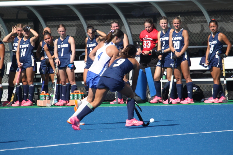 IMG_0461.jpg :: Saint Louis University (SLU) Women's Field Hockey vs University of California Davis 2025 at the SLU Field Hockey Complex. UC Davis won 2 to 1. The UC Davis players are wearing pink shoes and there are Pink Ribbons painted on the players sticks. Today is Billikens Pink Game for Breast Cancer Awareness and Alumnae Day. This is the second season at the new SLU Field Hockey Complex, and it marks, the 50th anniversary of the St. Louis University Field Hockey program which began in 1975. NCAA Division I 