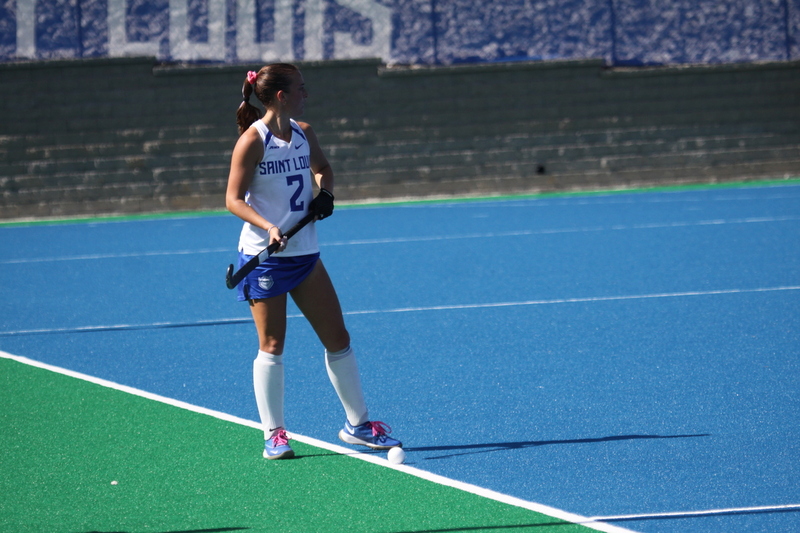 IMG_0472.jpg :: Saint Louis University (SLU) Women's Field Hockey vs University of California Davis 2025 at the SLU Field Hockey Complex. UC Davis won 2 to 1. The UC Davis players are wearing pink shoes and there are Pink Ribbons painted on the players sticks. Today is Billikens Pink Game for Breast Cancer Awareness and Alumnae Day. This is the second season at the new SLU Field Hockey Complex, and it marks, the 50th anniversary of the St. Louis University Field Hockey program which began in 1975. NCAA Division I 