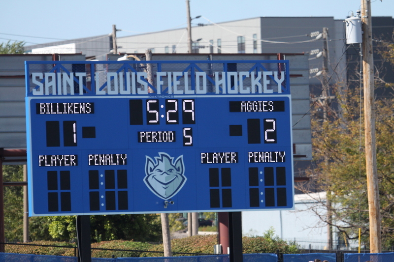 IMG_0480.jpg :: Saint Louis University (SLU) Women's Field Hockey vs University of California Davis 2025 at the SLU Field Hockey Complex. UC Davis won 2 to 1. The UC Davis players are wearing pink shoes and there are Pink Ribbons painted on the players sticks. Today is Billikens Pink Game for Breast Cancer Awareness and Alumnae Day. This is the second season at the new SLU Field Hockey Complex, and it marks, the 50th anniversary of the St. Louis University Field Hockey program which began in 1975. NCAA Division I 