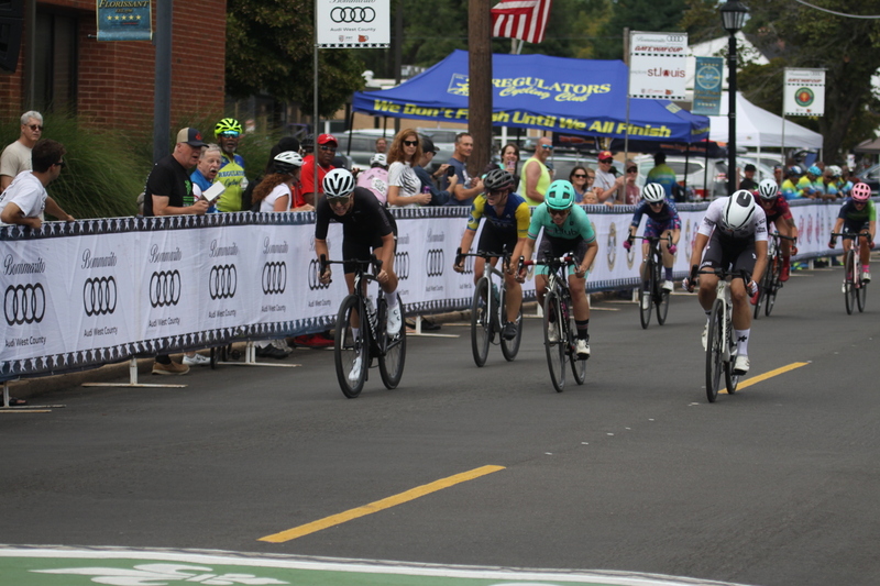 IMG_0520.jpg :: Tour de Florissant 2025/Gateway Cup 2025 - Women's 3-4-5 & Women's 40+, 40 minutes of racing, a field of 75 riders - September, 1st, 2025 - Tour de Florissant - New Course for 2025! The fourth and final leg of the Gateway Cup gets underway in Historic Old Town Florissant in St. Louis County. This technical course races through one of St. Louis' most nostalgic locales. Note - the course has been shifted to a flat finish in front of Historic City Hall, one mild climb, 6 turns. Category 4 (CAT 4) After gaining some experience, riders can upgrade to CAT 4, where races are longer and more competitive. Category 3 (CAT 3) This intermediate category features longer and more challenging races, requiring a good understanding of racing tactics. USA Cycling 