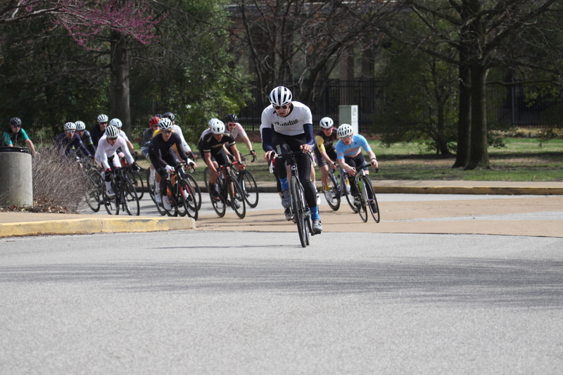Mike Murray Classic Criterium 2025 D -LXXIX.jpg :: Tour of St. Louis in St. Louis, Missouri, USA., today's race is the Mike Murray Classic Criterium 2025, USAC CAT 4 BAR, 60 Min. race. Mike Murray Classic Course - A flat and fast course with wide open straightaways and a few technical turns. Race by St. Louis landmarks, the Missouri History Museum and The Muny Opera. Peloton - In a bicycle race, the term - Peloton - refers to the main group of riders, also known as the -pack- or -bunch-. Riders race in a pack to draft, which means they ride closely together to save energy and improve speed. 
