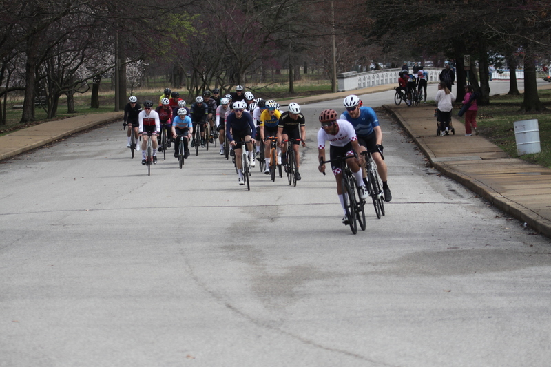 Mike Murray Classic Criterium 2025 D -LXXV.jpg :: Tour of St. Louis in St. Louis, Missouri, USA., today's race is the Mike Murray Classic Criterium 2025, USAC CAT 4 BAR, 60 Min. race. Mike Murray Classic Course - A flat and fast course with wide open straightaways and a few technical turns. Race by St. Louis landmarks, the Missouri History Museum and The Muny Opera. Peloton - In a bicycle race, the term - Peloton - refers to the main group of riders, also known as the -pack- or -bunch-. Riders race in a pack to draft, which means they ride closely together to save energy and improve speed. 