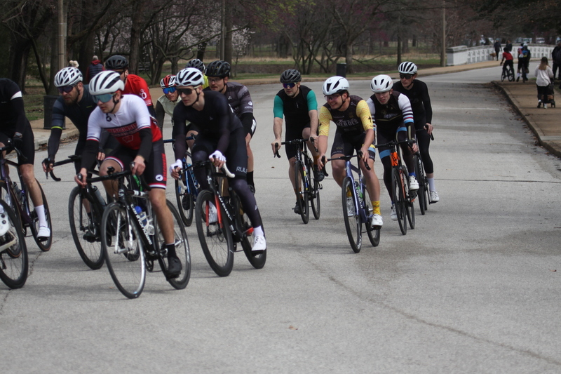 Mike Murray Classic Criterium 2025 D -LXXVIII.jpg :: Tour of St. Louis in St. Louis, Missouri, USA., today's race is the Mike Murray Classic Criterium 2025, USAC CAT 4 BAR, 60 Min. race. Mike Murray Classic Course - A flat and fast course with wide open straightaways and a few technical turns. Race by St. Louis landmarks, the Missouri History Museum and The Muny Opera. Peloton - In a bicycle race, the term - Peloton - refers to the main group of riders, also known as the -pack- or -bunch-. Riders race in a pack to draft, which means they ride closely together to save energy and improve speed. 