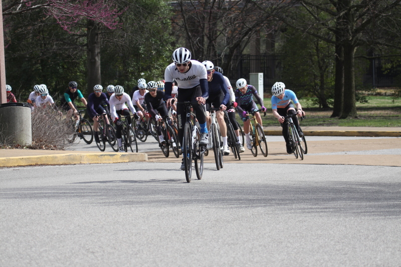 Mike Murray Classic Criterium 2025 D -LXXXI.jpg :: Tour of St. Louis in St. Louis, Missouri, USA., today's race is the Mike Murray Classic Criterium 2025, USAC CAT 4 BAR, 60 Min. race. Mike Murray Classic Course - A flat and fast course with wide open straightaways and a few technical turns. Race by St. Louis landmarks, the Missouri History Museum and The Muny Opera. Peloton - In a bicycle race, the term - Peloton - refers to the main group of riders, also known as the -pack- or -bunch-. Riders race in a pack to draft, which means they ride closely together to save energy and improve speed. 