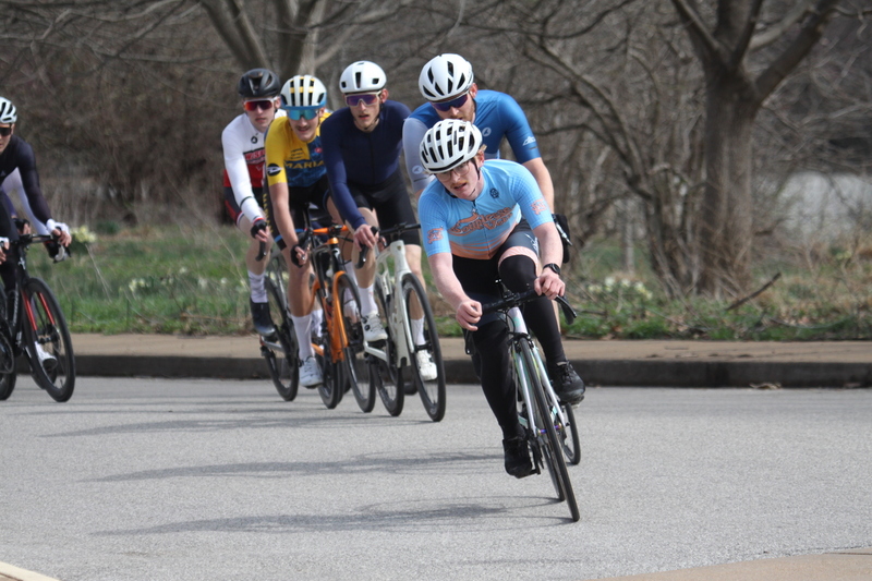 Mike Murray Classic Criterium 2025 D -LXXXX.jpg :: Tour of St. Louis in St. Louis, Missouri, USA., today's race is the Mike Murray Classic Criterium 2025, USAC CAT 4 BAR, 60 Min. race. Mike Murray Classic Course - A flat and fast course with wide open straightaways and a few technical turns. Race by St. Louis landmarks, the Missouri History Museum and The Muny Opera. Peloton - In a bicycle race, the term - Peloton - refers to the main group of riders, also known as the -pack- or -bunch-. Riders race in a pack to draft, which means they ride closely together to save energy and improve speed. 