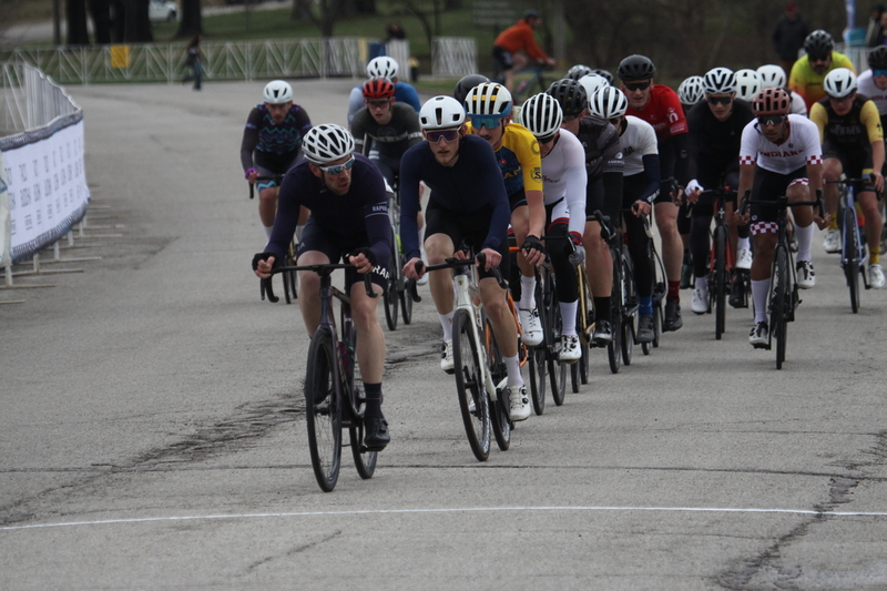 Mike Murray Classic Criterium 2025 E -II.jpg :: Tour of St. Louis in St. Louis, Missouri, USA., today's race is the Mike Murray Classic Criterium 2025, USAC CAT 4 BAR, 60 Min. race. Mike Murray Classic Course - A flat and fast course with wide open straightaways and a few technical turns. Race by St. Louis landmarks, the Missouri History Museum and The Muny Opera. Peloton - In a bicycle race, the term - Peloton - refers to the main group of riders, also known as the -pack- or -bunch-. Riders race in a pack to draft, which means they ride closely together to save energy and improve speed. 