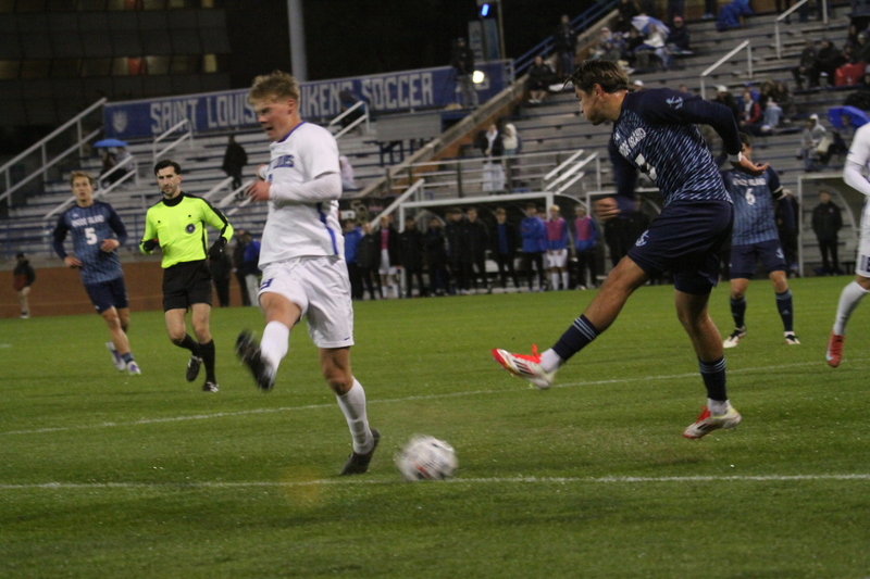 Saint Louis University (SLU) Mens Soccer vs Rhode Island 2025 XXIV.jpg :: Saint Louis University (SLU) Billikens' Men's Soccer vs University of Rhode Island (URI) Rams 2025 at Robert R. Hermann Stadium in St. Louis, Missouri, USA. November 1st 2025 the match ended in a 1-1 tie. The night was cold and damp with a rain that mild but steady. NCAA Men's Soccer in the A10 Conference. 