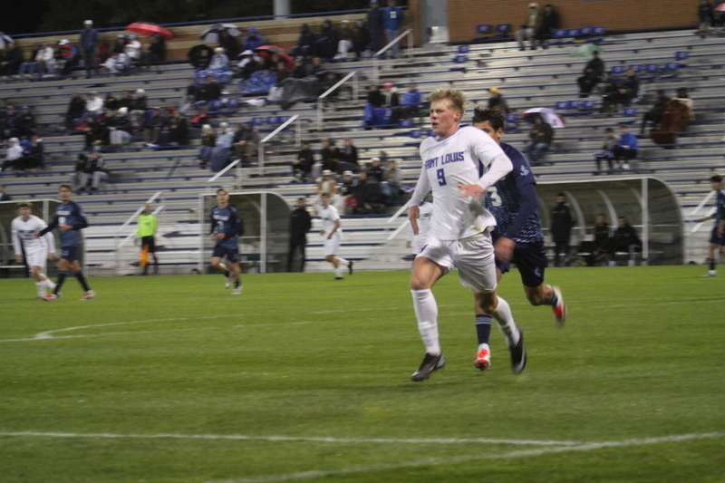 Saint Louis University (SLU) Mens Soccer vs Rhode Island 2025 XXVIII.jpg :: Saint Louis University (SLU) Billikens' Men's Soccer vs University of Rhode Island (URI) Rams 2025 at Robert R. Hermann Stadium in St. Louis, Missouri, USA. November 1st 2025 the match ended in a 1-1 tie. The night was cold and damp with a rain that mild but steady. NCAA Men's Soccer in the A10 Conference. 