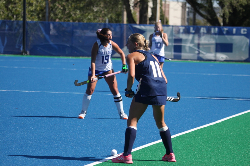 Saint Louis University (SLU) Womens Field Hockey vs UC Davis 2025 LXXXIV.jpg :: Saint Louis University (SLU) Women's Field Hockey vs University of California Davis 2025 at the SLU Field Hockey Complex. UC Davis won 2 to 1. The UC Davis players are wearing pink shoes and there are Pink Ribbons painted on the players sticks. Today is Billikens Pink Game for Breast Cancer Awareness and Alumnae Day. This is the second season at the new SLU Field Hockey Complex, and it marks, the 50th anniversary of the St. Louis University Field Hockey program which began in 1975. NCAA Division I 