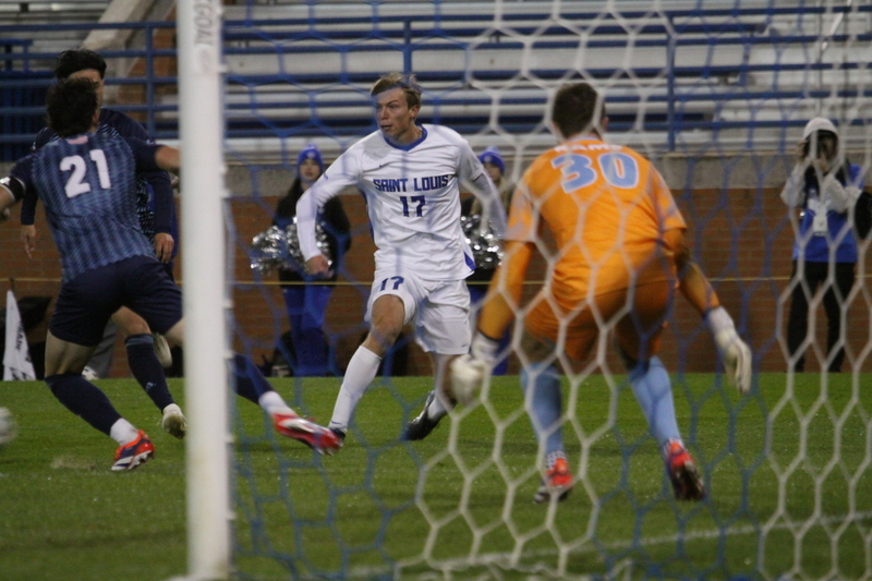 Saint Louis University Mens Soccer vs University of Rhode Island 2025 III.jpg :: Saint Louis University (SLU) Men's Soccer vs University of Rhode Island (URI) at Robert R. Hermann Stadium in St. Louis, Missouri, USA on a wet and cold night. The rain began in early afternoon and continued off and on all night. This was a Division I match up of NCAA Men's Soccer November 1st 2025. 