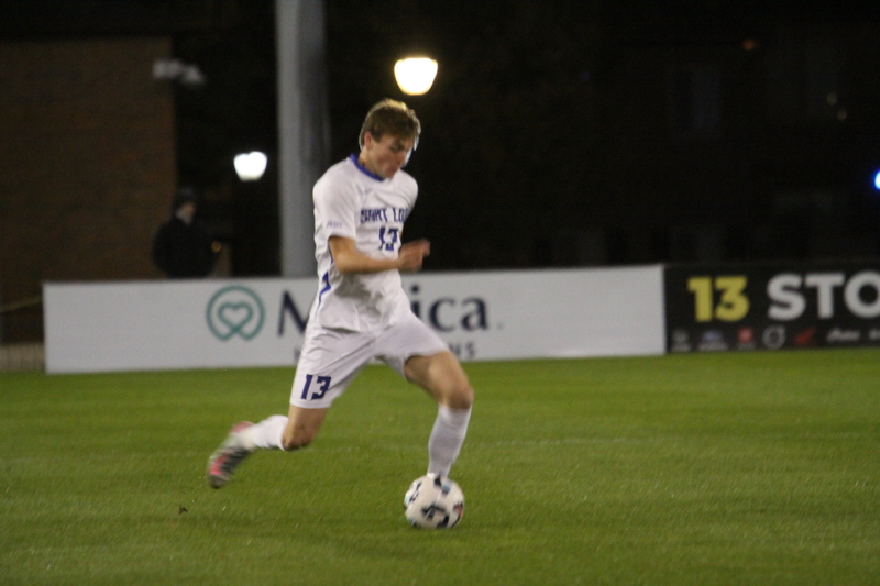 Saint Louis University Mens Soccer vs University of Rhode Island 2025 IV.jpg :: Saint Louis University (SLU) Men's Soccer vs University of Rhode Island (URI) at Robert R. Hermann Stadium in St. Louis, Missouri, USA on a wet and cold night. The rain began in early afternoon and continued off and on all night. This was a Division I match up of NCAA Men's Soccer November 1st 2025. 