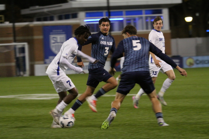 Saint Louis University Mens Soccer vs University of Rhode Island 2025 VIII.jpg :: Saint Louis University (SLU) Men's Soccer vs University of Rhode Island (URI) at Robert R. Hermann Stadium in St. Louis, Missouri, USA on a wet and cold night. The rain began in early afternoon and continued off and on all night. This was a Division I match up of NCAA Men's Soccer November 1st 2025. 