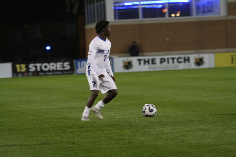 Saint Louis University Mens Soccer vs University of Rhode Island 2025 XIX.jpg :: Saint Louis University (SLU) Men's Soccer vs University of Rhode Island (URI) at Robert R. Hermann Stadium in St. Louis, Missouri, USA on a wet and cold night. The rain began in early afternoon and continued off and on all night. This was a Division I match up of NCAA Men's Soccer November 1st 2025. 