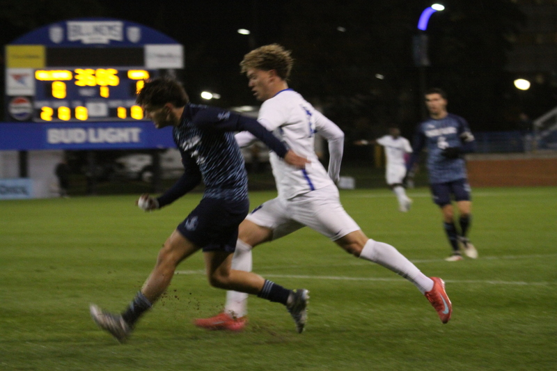 Saint Louis University Mens Soccer vs University of Rhode Island 2025 XVIII.jpg :: Saint Louis University (SLU) Men's Soccer vs University of Rhode Island (URI) at Robert R. Hermann Stadium in St. Louis, Missouri, USA on a wet and cold night. The rain began in early afternoon and continued off and on all night. This was a Division I match up of NCAA Men's Soccer November 1st 2025. 