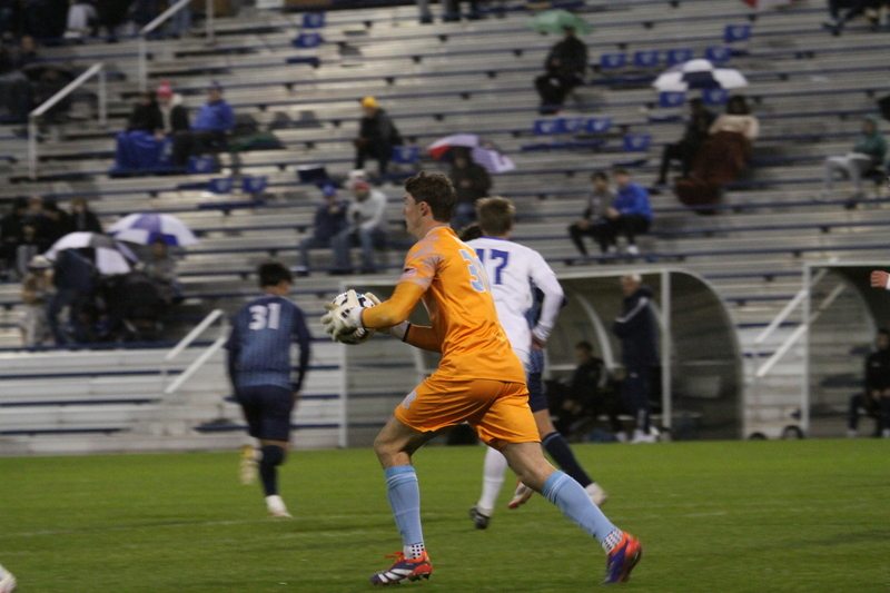 Saint Louis University Mens Soccer vs University of Rhode Island 2025 XX.jpg :: Saint Louis University (SLU) Men's Soccer vs University of Rhode Island (URI) at Robert R. Hermann Stadium in St. Louis, Missouri, USA on a wet and cold night. The rain began in early afternoon and continued off and on all night. This was a Division I match up of NCAA Men's Soccer November 1st 2025. 
