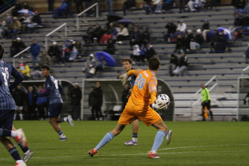 Saint Louis University Mens Soccer vs University of Rhode Island 2025 XXI.jpg :: Saint Louis University (SLU) Men's Soccer vs University of Rhode Island (URI) at Robert R. Hermann Stadium in St. Louis, Missouri, USA on a wet and cold night. The rain began in early afternoon and continued off and on all night. This was a Division I match up of NCAA Men's Soccer November 1st 2025. 