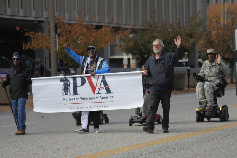 St Louis Veterans Day Parade 2025 L.jpg :: St Louis Veterans Day Parade on Market Street in Downtown St. Louis, Missouri, USA. The parade was proceeded by a race and walk 10th Annual Veterans Day 5K ended at the Old City Hall and Soldiers Memorial Military Museum on 1315 Chestnut, St. Louis, Missouri, USA. The Parade consists of JROTC, Cars, Motorcycles, VA Organizations, Moolah Shriners (YOMO), DAV, and Marching supporters.    