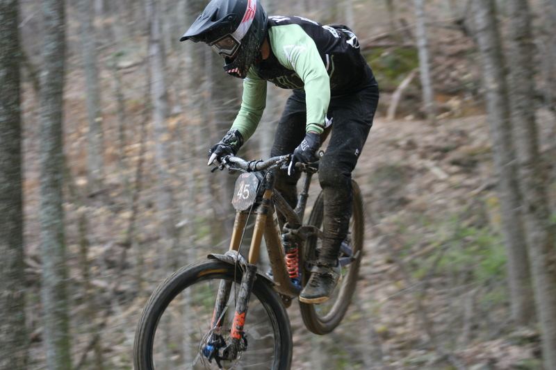 Tennessee National Mountain Bike Festival 2023 IV.jpg :: Tennessee National 2023 - Tennessee Mountain Bike Festival 2023 - Windrock Bicycle Park in Oliver Springs, Tennessee, USA. Mountain Bike Downhill on the wooded trail in hills of Tennessee. Fast downhill action with aerials throughout the run. Red Bull gives you wings. 