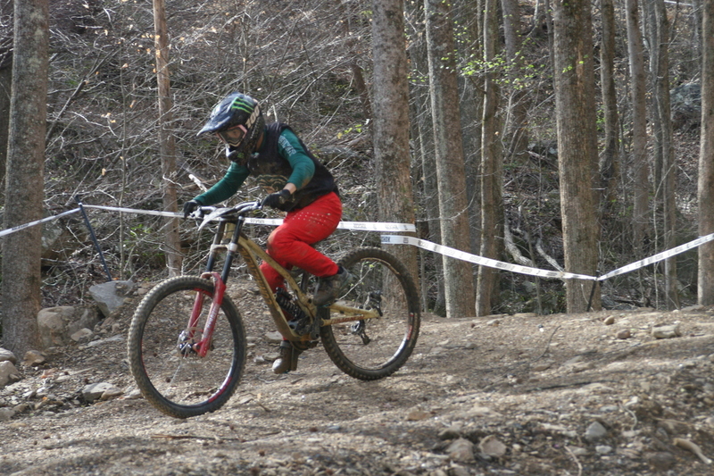 Tennessee National Mountain Bike Festival 2023 L.jpg :: Tennessee National 2023 - Tennessee Mountain Bike Festival 2023 - Windrock Bicycle Park in Oliver Springs, Tennessee, USA. Mountain Bike Downhill on the wooded trail in hills of Tennessee. Fast downhill action with aerials throughout the run. Red Bull gives you wings. 