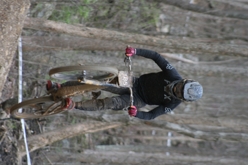 Tennessee National Mountain Bike Festival 2023 LIII.jpg :: Tennessee National 2023 - Tennessee Mountain Bike Festival 2023 - Windrock Bicycle Park in Oliver Springs, Tennessee, USA. Mountain Bike Downhill on the wooded trail in hills of Tennessee. Fast downhill action with aerials throughout the run. Red Bull gives you wings. 