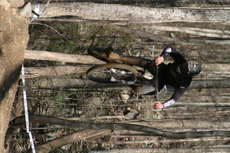 Tennessee National Mountain Bike Festival 2023 LIX.jpg :: Tennessee National 2023 - Tennessee Mountain Bike Festival 2023 - Windrock Bicycle Park in Oliver Springs, Tennessee, USA. Mountain Bike Downhill on the wooded trail in hills of Tennessee. Fast downhill action with aerials throughout the run. Red Bull gives you wings. 