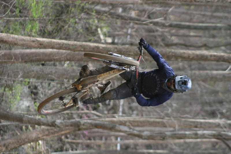 Tennessee National Mountain Bike Festival 2023 LVII.jpg :: Tennessee National 2023 - Tennessee Mountain Bike Festival 2023 - Windrock Bicycle Park in Oliver Springs, Tennessee, USA. Mountain Bike Downhill on the wooded trail in hills of Tennessee. Fast downhill action with aerials throughout the run. Red Bull gives you wings. 