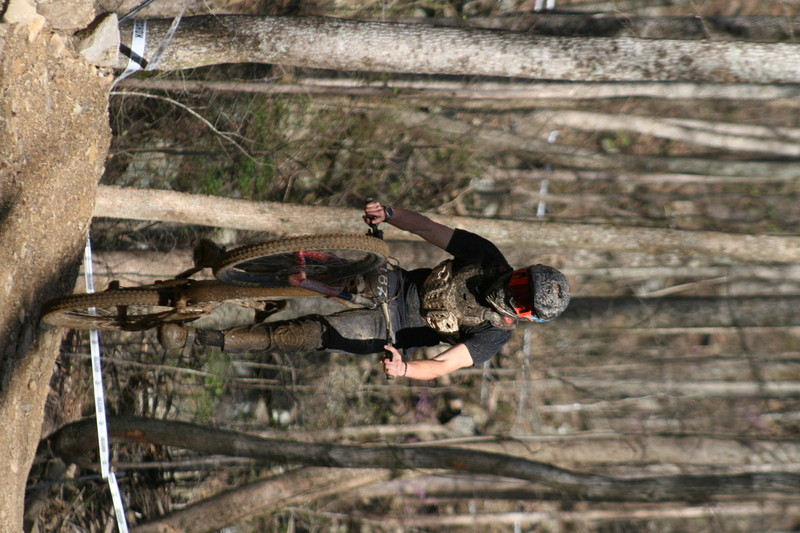 Tennessee National Mountain Bike Festival 2023 LXII.jpg :: Tennessee National 2023 - Tennessee Mountain Bike Festival 2023 - Windrock Bicycle Park in Oliver Springs, Tennessee, USA. Mountain Bike Downhill on the wooded trail in hills of Tennessee. Fast downhill action with aerials throughout the run. Red Bull gives you wings. 