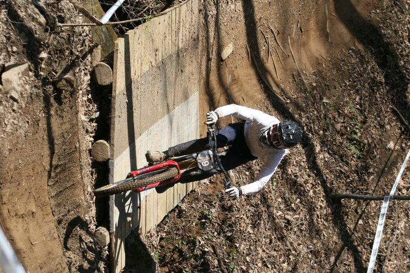 Tennessee National Mountain Bike Festival 2023 LXIV.jpg :: Tennessee National 2023 - Tennessee Mountain Bike Festival 2023 - Windrock Bicycle Park in Oliver Springs, Tennessee, USA. Mountain Bike Downhill on the wooded trail in hills of Tennessee. Fast downhill action with aerials throughout the run. Red Bull gives you wings. 