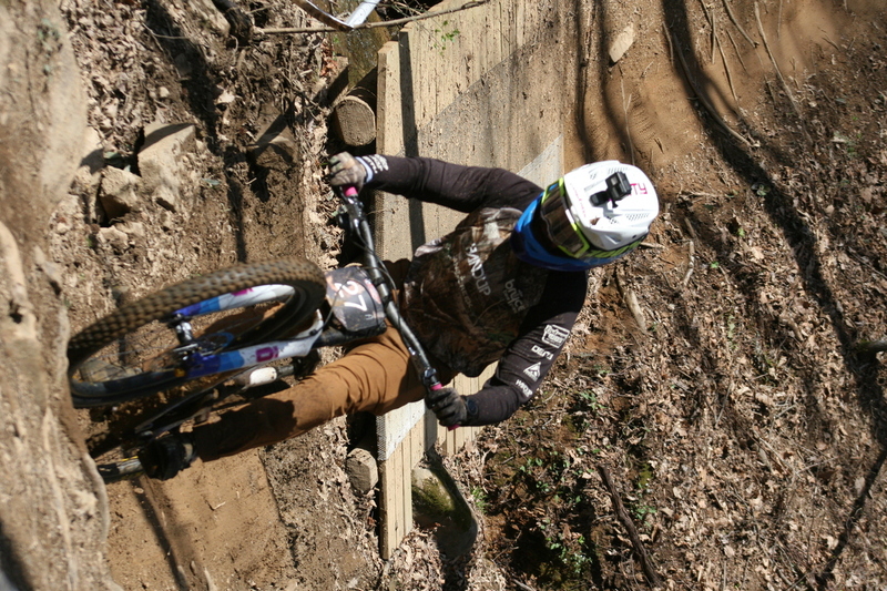 Tennessee National Mountain Bike Festival 2023 LXV.jpg :: Tennessee National 2023 - Tennessee Mountain Bike Festival 2023 - Windrock Bicycle Park in Oliver Springs, Tennessee, USA. Mountain Bike Downhill on the wooded trail in hills of Tennessee. Fast downhill action with aerials throughout the run. Red Bull gives you wings. 