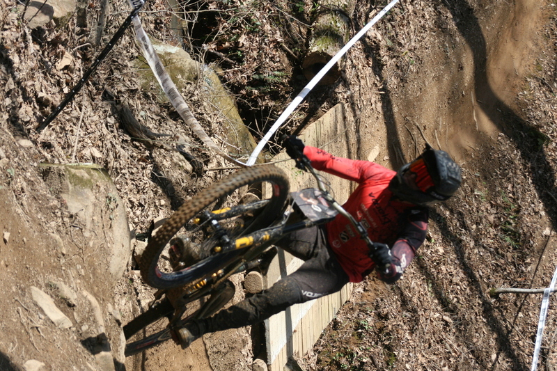 Tennessee National Mountain Bike Festival 2023 LXXIV.jpg :: Tennessee National 2023 - Tennessee Mountain Bike Festival 2023 - Windrock Bicycle Park in Oliver Springs, Tennessee, USA. Mountain Bike Downhill on the wooded trail in hills of Tennessee. Fast downhill action with aerials throughout the run. Red Bull gives you wings. 
