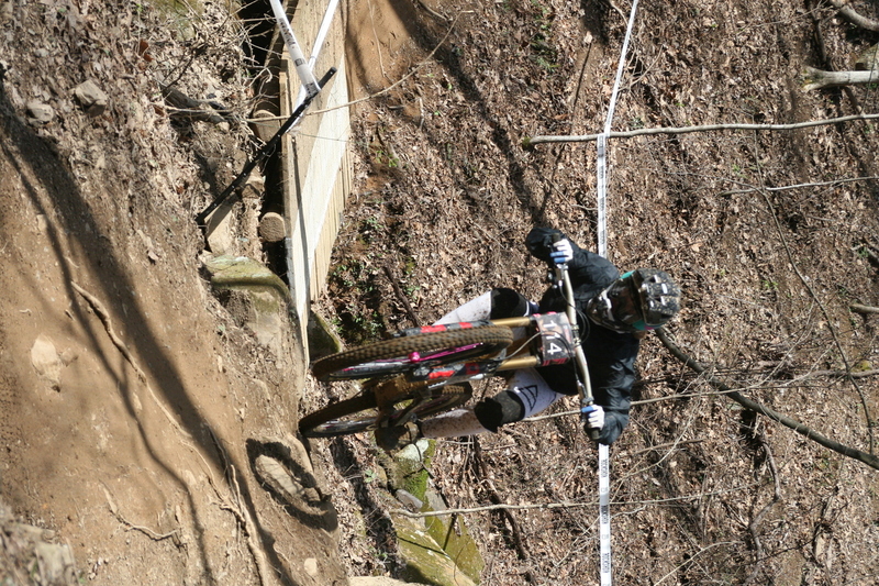 Tennessee National Mountain Bike Festival 2023 LXXXI.jpg :: Tennessee National 2023 - Tennessee Mountain Bike Festival 2023 - Windrock Bicycle Park in Oliver Springs, Tennessee, USA. Mountain Bike Downhill on the wooded trail in hills of Tennessee. Fast downhill action with aerials throughout the run. Red Bull gives you wings. 