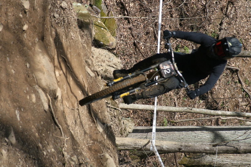 Tennessee National Mountain Bike Festival 2023 LXXXIX.jpg :: Tennessee National 2023 - Tennessee Mountain Bike Festival 2023 - Windrock Bicycle Park in Oliver Springs, Tennessee, USA. Mountain Bike Downhill on the wooded trail in hills of Tennessee. Fast downhill action with aerials throughout the run. Red Bull gives you wings. 