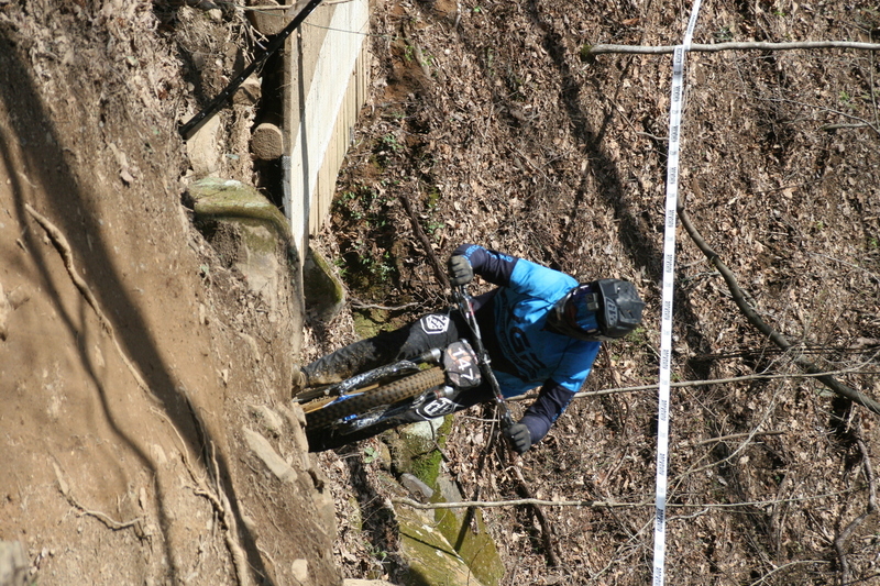 Tennessee National Mountain Bike Festival 2023 LXXXV.jpg :: Tennessee National 2023 - Tennessee Mountain Bike Festival 2023 - Windrock Bicycle Park in Oliver Springs, Tennessee, USA. Mountain Bike Downhill on the wooded trail in hills of Tennessee. Fast downhill action with aerials throughout the run. Red Bull gives you wings. 