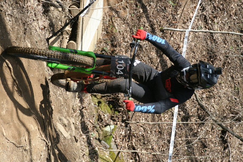 Tennessee National Mountain Bike Festival 2023 LXXXVI.jpg :: Tennessee National 2023 - Tennessee Mountain Bike Festival 2023 - Windrock Bicycle Park in Oliver Springs, Tennessee, USA. Mountain Bike Downhill on the wooded trail in hills of Tennessee. Fast downhill action with aerials throughout the run. Red Bull gives you wings. 