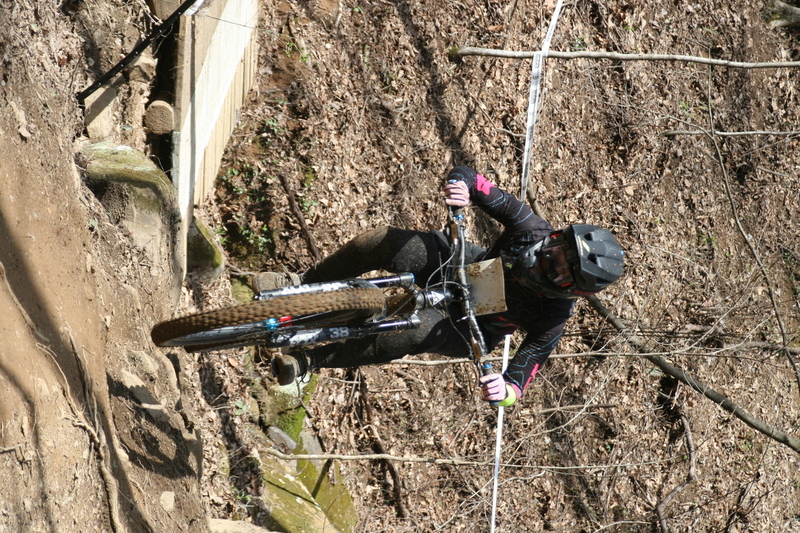 Tennessee National Mountain Bike Festival 2023 LXXXVII.jpg :: Tennessee National 2023 - Tennessee Mountain Bike Festival 2023 - Windrock Bicycle Park in Oliver Springs, Tennessee, USA. Mountain Bike Downhill on the wooded trail in hills of Tennessee. Fast downhill action with aerials throughout the run. Red Bull gives you wings. 