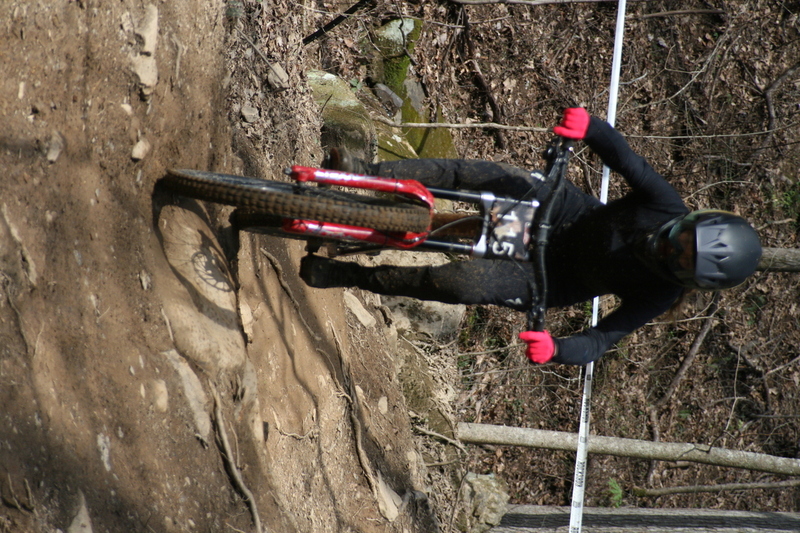 Tennessee National Mountain Bike Festival 2023 LXXXVIII.jpg :: Tennessee National 2023 - Tennessee Mountain Bike Festival 2023 - Windrock Bicycle Park in Oliver Springs, Tennessee, USA. Mountain Bike Downhill on the wooded trail in hills of Tennessee. Fast downhill action with aerials throughout the run. Red Bull gives you wings. 