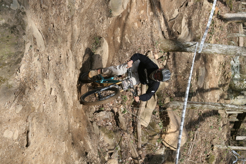 Tennessee National Mountain Bike Festival 2023 LXXXXIX.jpg :: Tennessee National 2023 - Tennessee Mountain Bike Festival 2023 - Windrock Bicycle Park in Oliver Springs, Tennessee, USA. Mountain Bike Downhill on the wooded trail in hills of Tennessee. Fast downhill action with aerials throughout the run. Red Bull gives you wings. 