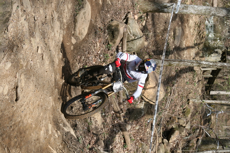 Tennessee National Mountain Bike Festival 2023 LXXXXV.jpg :: Tennessee National 2023 - Tennessee Mountain Bike Festival 2023 - Windrock Bicycle Park in Oliver Springs, Tennessee, USA. Mountain Bike Downhill on the wooded trail in hills of Tennessee. Fast downhill action with aerials throughout the run. Red Bull gives you wings. 