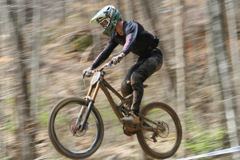 Tennessee National Mountain Bike Festival 2023 VI.jpg :: Tennessee National 2023 - Tennessee Mountain Bike Festival 2023 - Windrock Bicycle Park in Oliver Springs, Tennessee, USA. Mountain Bike Downhill on the wooded trail in hills of Tennessee. Fast downhill action with aerials throughout the run. Red Bull gives you wings. 