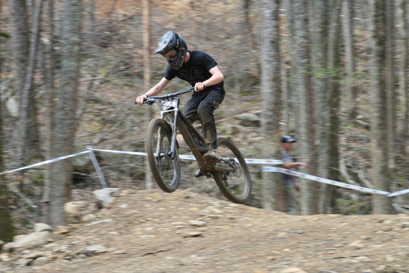 Tennessee National Mountain Bike Festival 2023 VII.jpg :: Tennessee National 2023 - Tennessee Mountain Bike Festival 2023 - Windrock Bicycle Park in Oliver Springs, Tennessee, USA. Mountain Bike Downhill on the wooded trail in hills of Tennessee. Fast downhill action with aerials throughout the run. Red Bull gives you wings. 