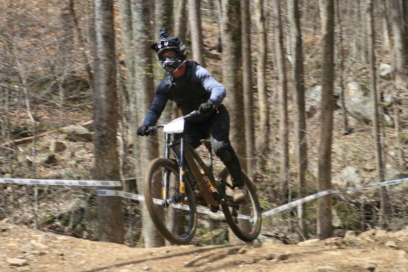 Tennessee National Mountain Bike Festival 2023 VIII.jpg :: Tennessee National 2023 - Tennessee Mountain Bike Festival 2023 - Windrock Bicycle Park in Oliver Springs, Tennessee, USA. Mountain Bike Downhill on the wooded trail in hills of Tennessee. Fast downhill action with aerials throughout the run. Red Bull gives you wings. 