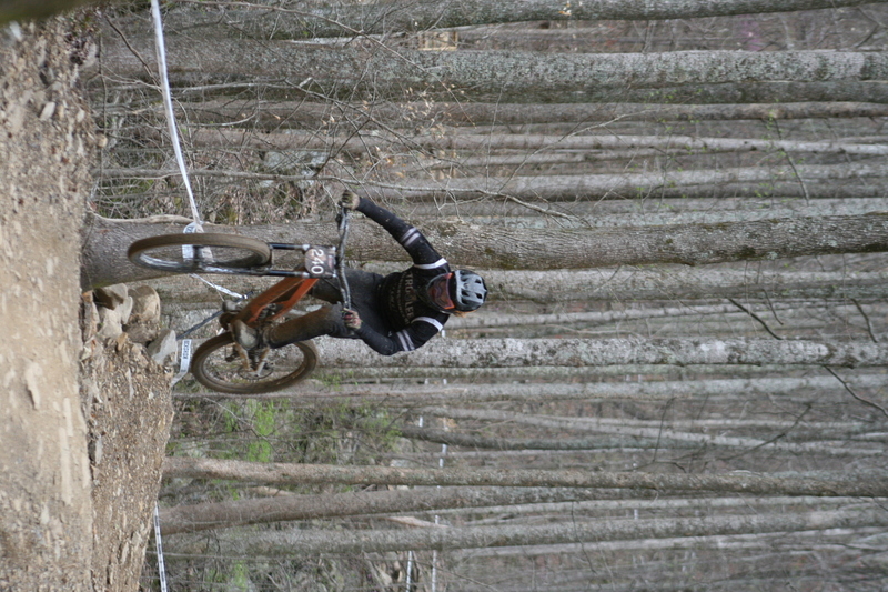 Tennessee National Mountain Bike Festival 2023 XIV.jpg :: Tennessee National 2023 - Tennessee Mountain Bike Festival 2023 - Windrock Bicycle Park in Oliver Springs, Tennessee, USA. Mountain Bike Downhill on the wooded trail in hills of Tennessee. Fast downhill action with aerials throughout the run. Red Bull gives you wings. 