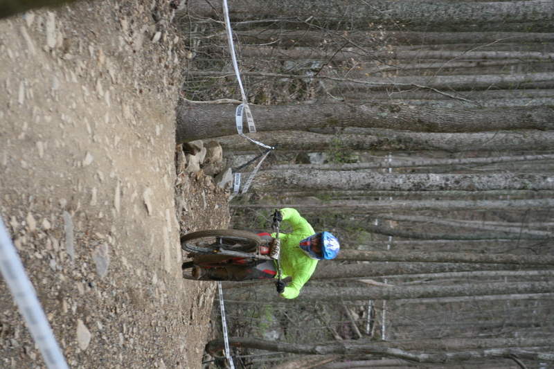 Tennessee National Mountain Bike Festival 2023 XV.jpg :: Tennessee National 2023 - Tennessee Mountain Bike Festival 2023 - Windrock Bicycle Park in Oliver Springs, Tennessee, USA. Mountain Bike Downhill on the wooded trail in hills of Tennessee. Fast downhill action with aerials throughout the run. Red Bull gives you wings. 