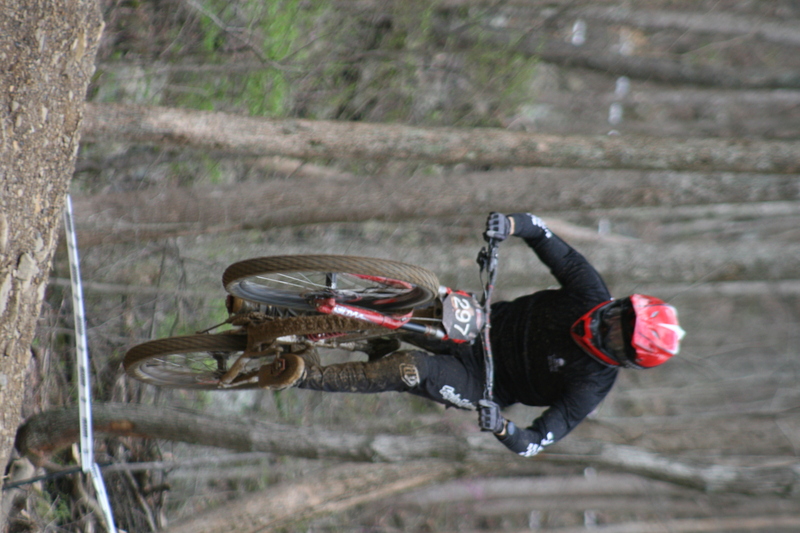 Tennessee National Mountain Bike Festival 2023 XX.jpg :: Tennessee National 2023 - Tennessee Mountain Bike Festival 2023 - Windrock Bicycle Park in Oliver Springs, Tennessee, USA. Mountain Bike Downhill on the wooded trail in hills of Tennessee. Fast downhill action with aerials throughout the run. Red Bull gives you wings. 