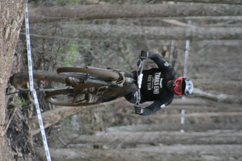Tennessee National Mountain Bike Festival 2023 XXI.jpg :: Tennessee National 2023 - Tennessee Mountain Bike Festival 2023 - Windrock Bicycle Park in Oliver Springs, Tennessee, USA. Mountain Bike Downhill on the wooded trail in hills of Tennessee. Fast downhill action with aerials throughout the run. Red Bull gives you wings. 