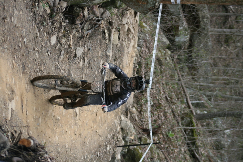 Tennessee National Mountain Bike Festival 2023 XXIX.jpg :: Tennessee National 2023 - Tennessee Mountain Bike Festival 2023 - Windrock Bicycle Park in Oliver Springs, Tennessee, USA. Mountain Bike Downhill on the wooded trail in hills of Tennessee. Fast downhill action with aerials throughout the run. Red Bull gives you wings. 