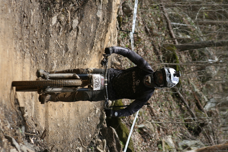 Tennessee National Mountain Bike Festival 2023 XXVI.jpg :: Tennessee National 2023 - Tennessee Mountain Bike Festival 2023 - Windrock Bicycle Park in Oliver Springs, Tennessee, USA. Mountain Bike Downhill on the wooded trail in hills of Tennessee. Fast downhill action with aerials throughout the run. Red Bull gives you wings. 