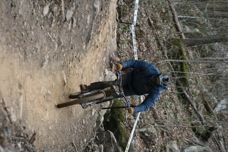 Tennessee National Mountain Bike Festival 2023 XXVIII.jpg :: Tennessee National 2023 - Tennessee Mountain Bike Festival 2023 - Windrock Bicycle Park in Oliver Springs, Tennessee, USA. Mountain Bike Downhill on the wooded trail in hills of Tennessee. Fast downhill action with aerials throughout the run. Red Bull gives you wings. 